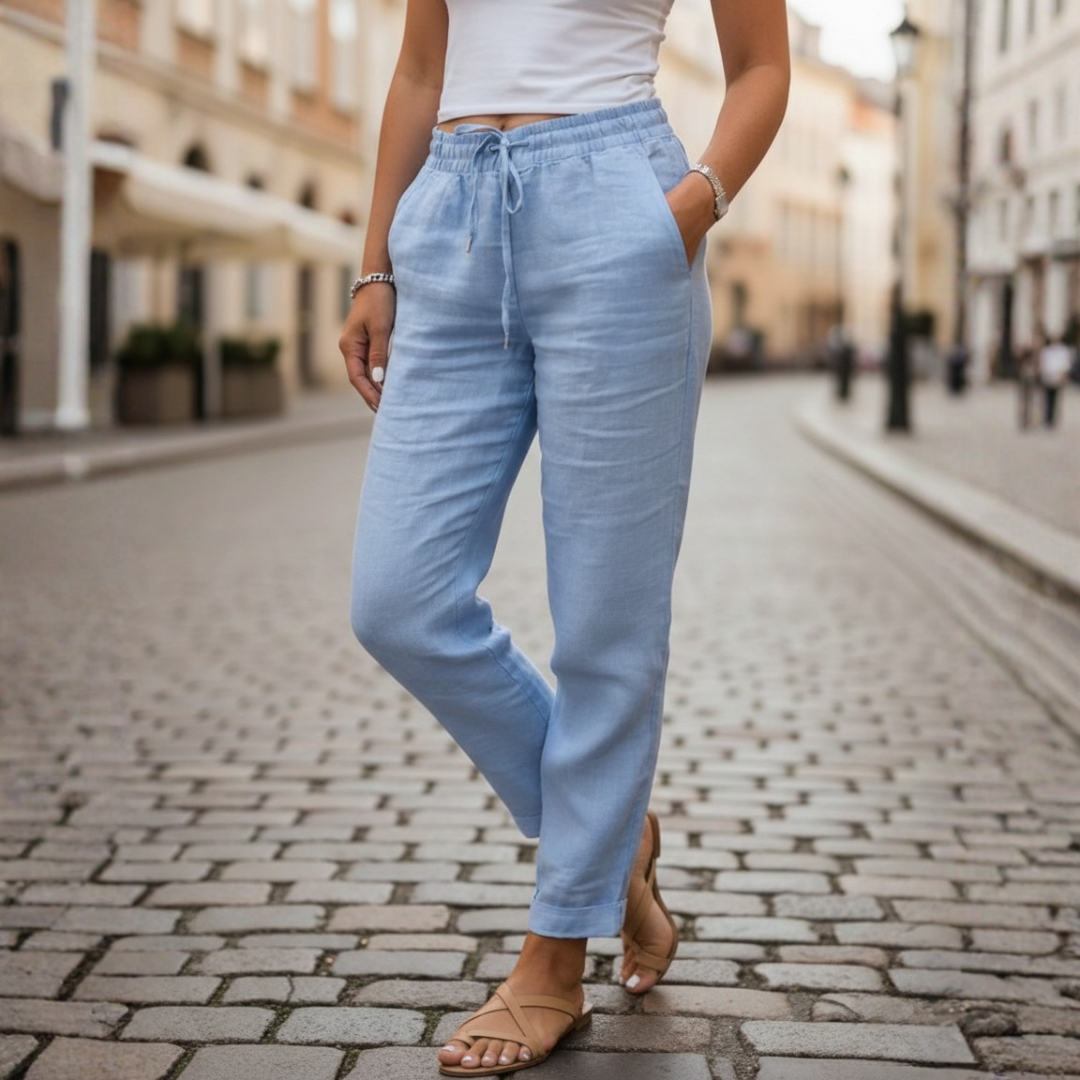 Close-up of elastic drawstring waist on women's tapered summer pants, ensuring a comfortable, adjustable fit.