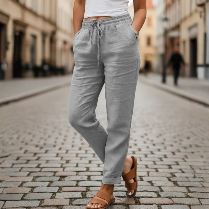 Tapered leg and cuffed hem detail of women's summer drawstring pants for a chic, relaxed look.