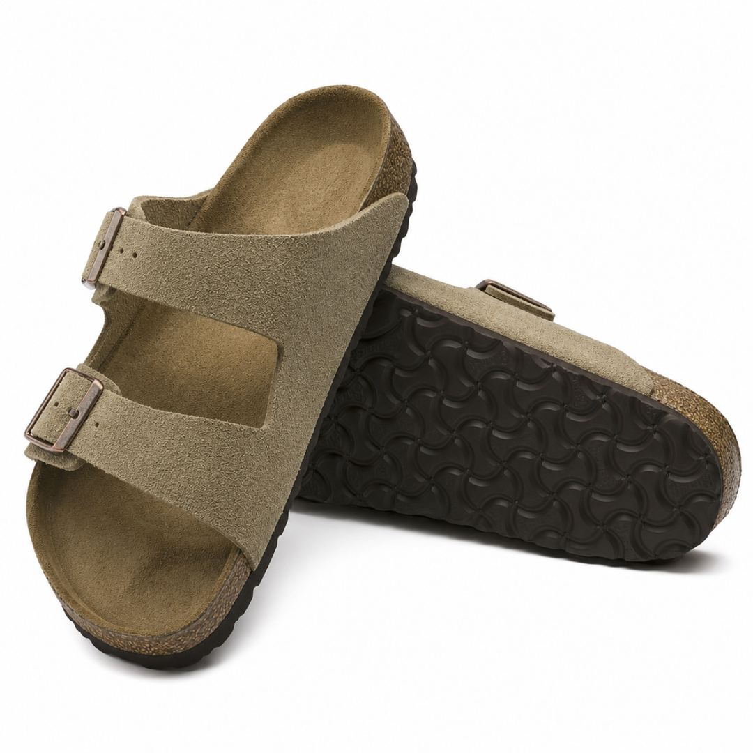Taupe casual slip-on sandals for women. Features ergonomic design and cushioned footbed for ultimate comfort.
