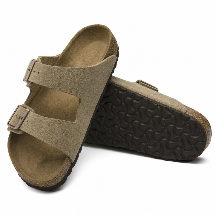 Taupe casual slip-on sandals for women. Features ergonomic design and cushioned footbed for ultimate comfort.