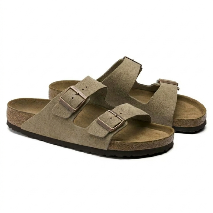 Comfort footwear: Women's taupe ergonomic sandals offering cushioned support and easy slip-on style for summer.