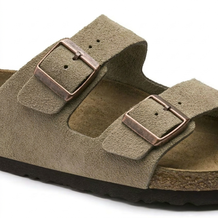 Fashionable taupe women's sandals for everyday wear. Cushioned support and ergonomic design ensure comfort.
