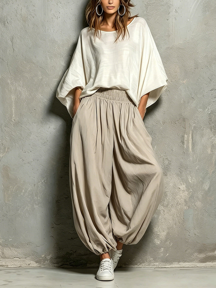 Women's taupe high waist wide leg harem pants. Comfortable drawstring casual wear for a relaxed, flowing boho look.