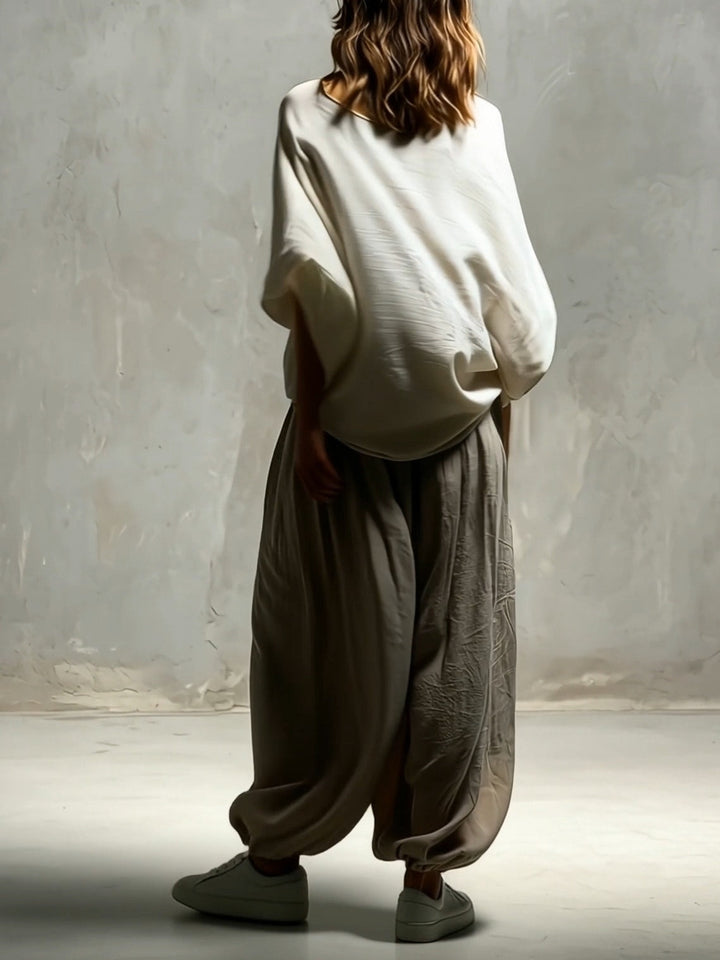 Stylish taupe wide leg harem pants with high waist & drawstring, perfect for lounge wear, travel, or casual outfits.