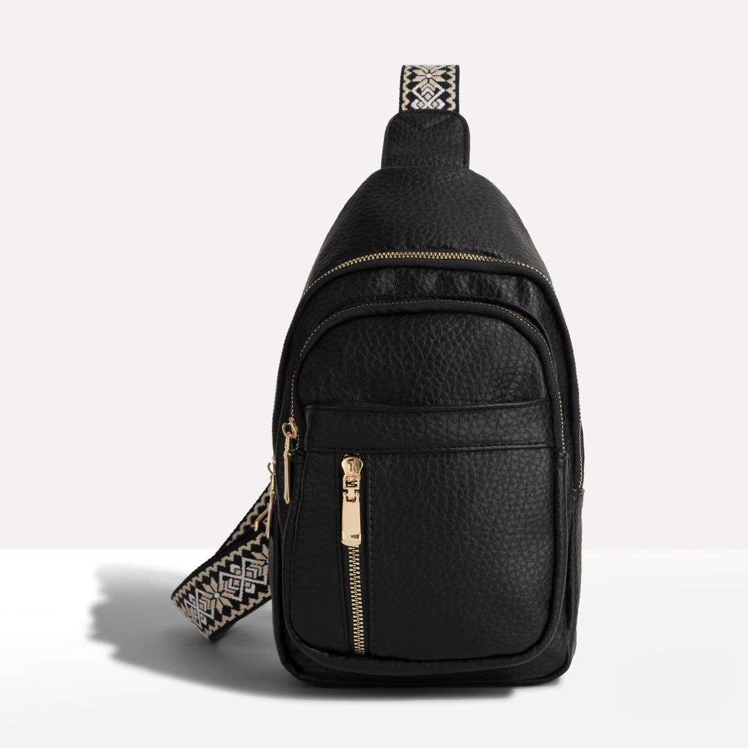 Women's textured anti-theft sling backpack, secure & stylish for everyday carry or travel with RFID protection.