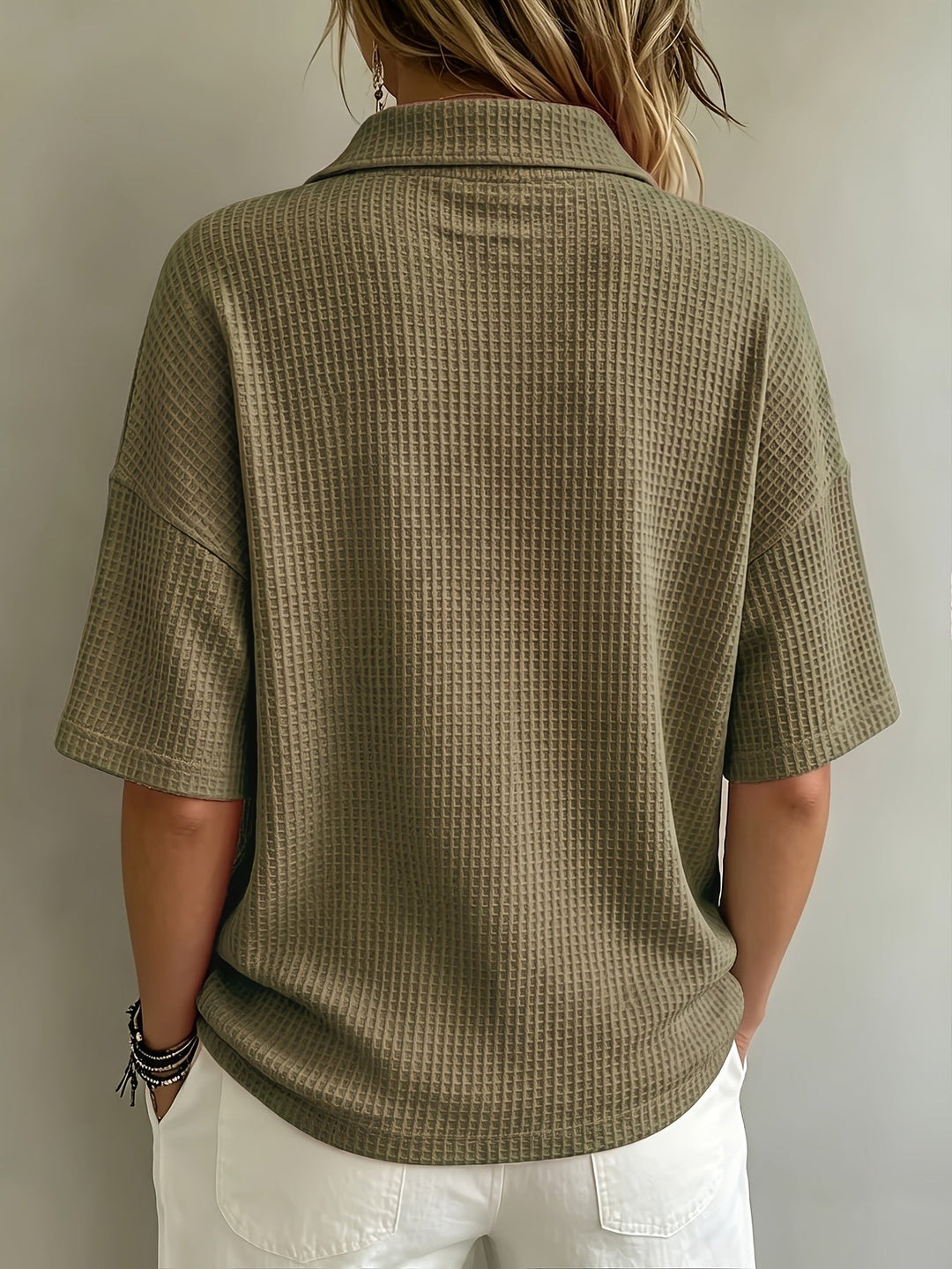 Comfortable women's collared polo top, versatile for spring, summer, and fall style.