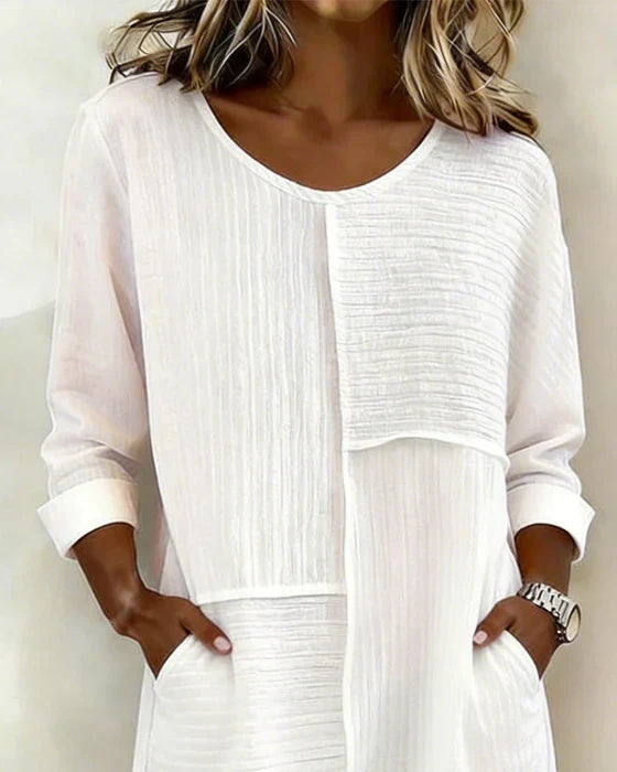 Chic women's relaxed-fit textured shift dress. Perfect for comfortable, casual spring & summer everyday wear.