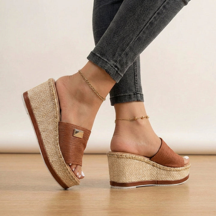 Comfortable women's platform espadrille wedge sandals with textured straps, great for casual summer outings.