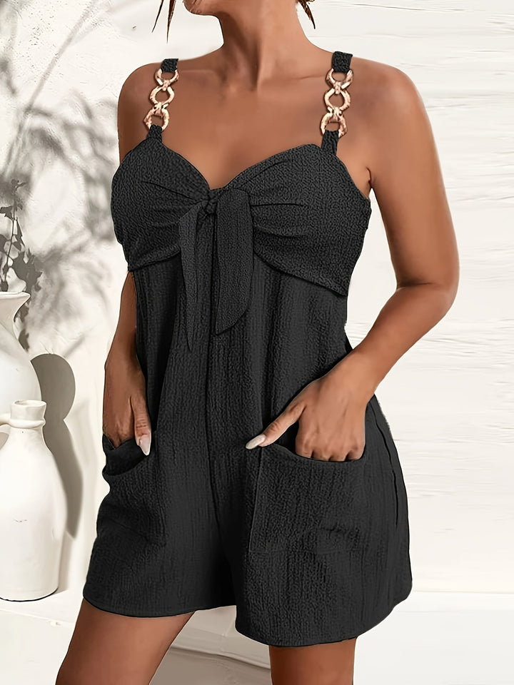 Women's textured sweetheart romper with elegant chain straps. Perfect for summer fashion & vacation wear.