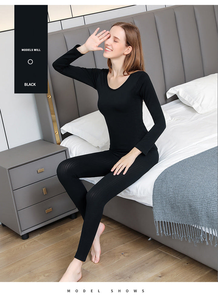 Warm women's thermal apparel set, ideal for cold weather activities & layering.
