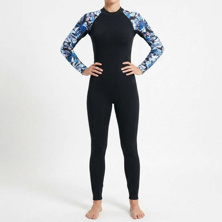 Patterned long-sleeve women's full-body wetsuit provides thermal protection for water sports & surfing.