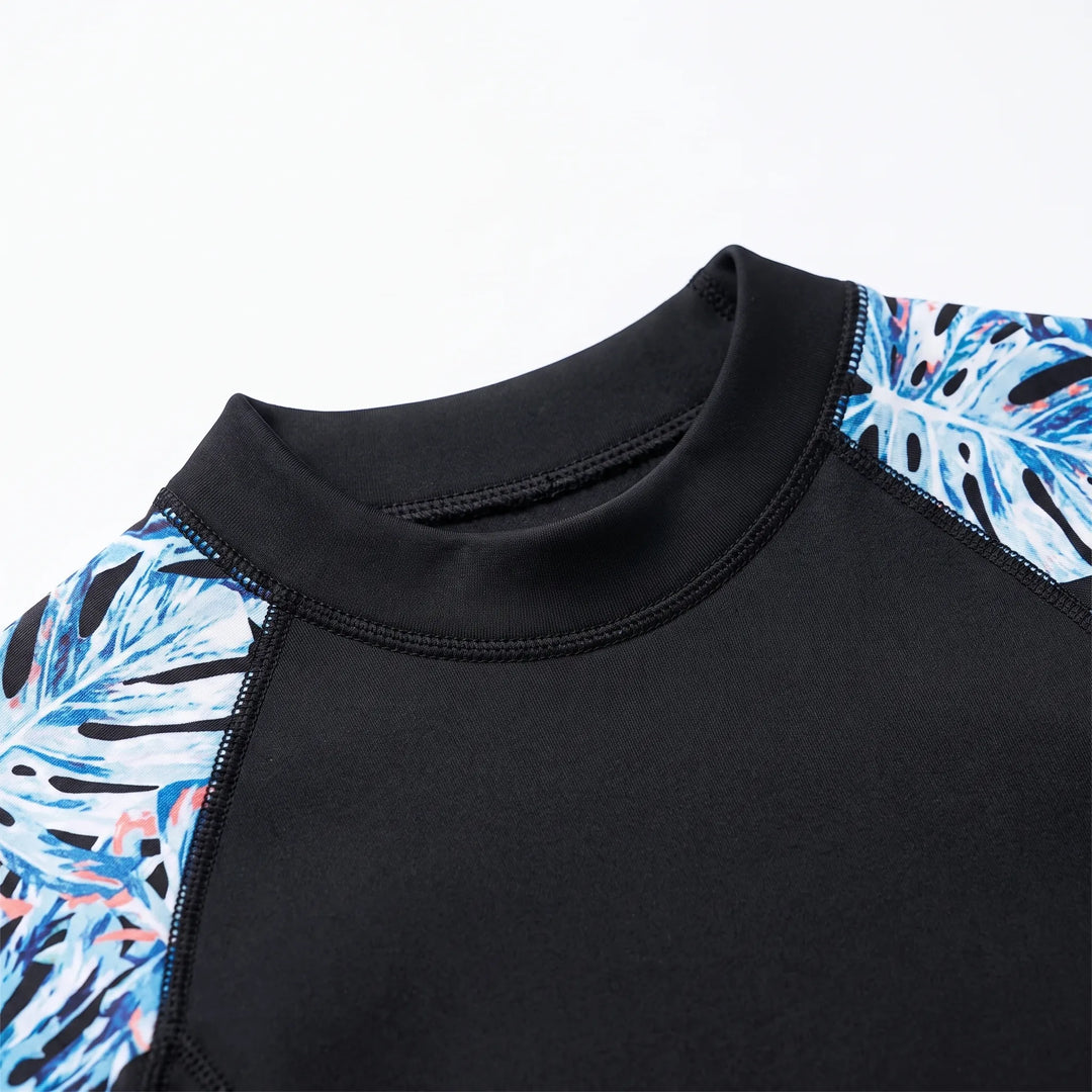 Active women's one-piece thermal full-body wetsuit for cold water. Offers warmth for swimming, surfing, diving.
