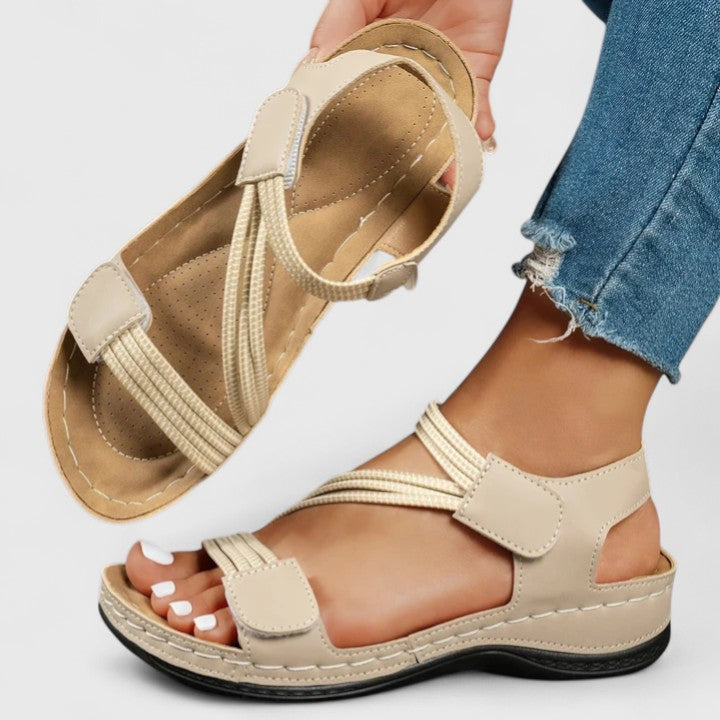 Back profile of women's orthopedic sandals, designed for posture correction and ultimate arch support.