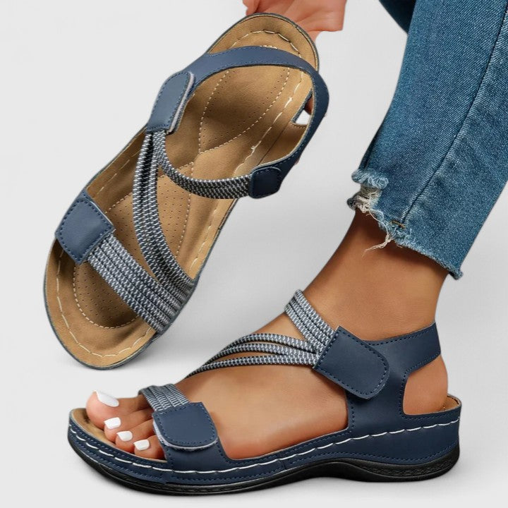 Women's orthopedic sandals with adjustable straps & three-arch support for personalized foot pain relief.