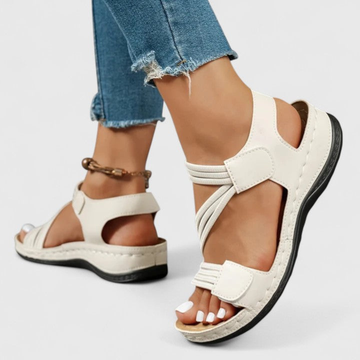 Top view: Women's comfortable summer sandals with arch support, perfect for active days & relief.