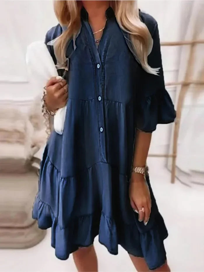 Stylish women's short tiered ruffle dress, button-down design. Ideal casual day dress for spring fashion.