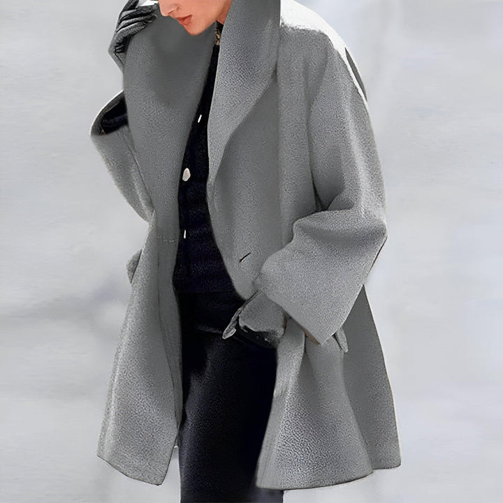 Women's versatile oversized winter coat. Perfect for casual comfort & office elegance. Chic and timeless outerwear.