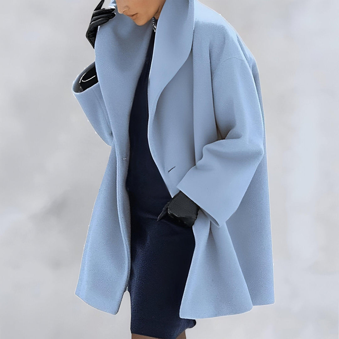 Classic women's oversized coat. Timeless fashion for elegant women, perfect as a winter coat or fall jacket.