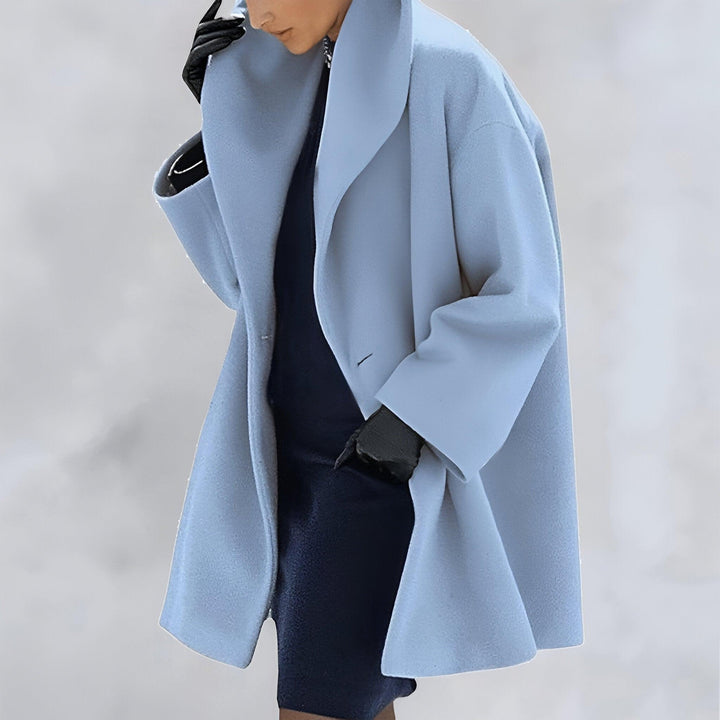 Classic women's oversized coat. Timeless fashion for elegant women, perfect as a winter coat or fall jacket.