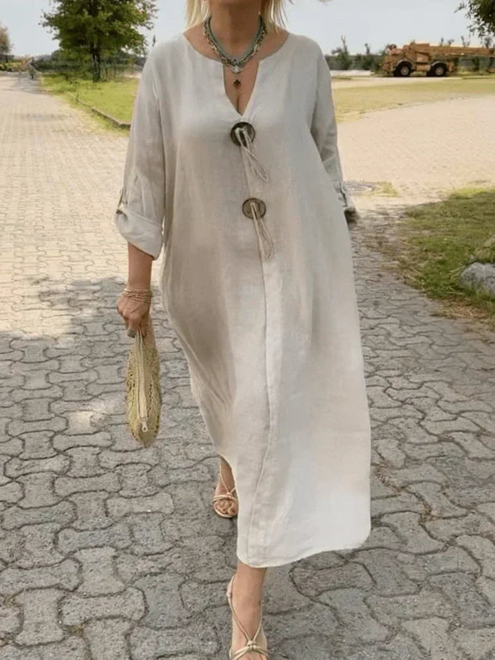 Elegant women's tunic dress with adjustable sleeves. A comfortable & versatile choice for summer and everyday wear.