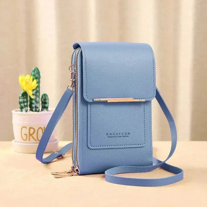 Women's everyday phone bag: touch screen enabled with a sturdy strap. Perfect for carrying your smartphone & small essentials.