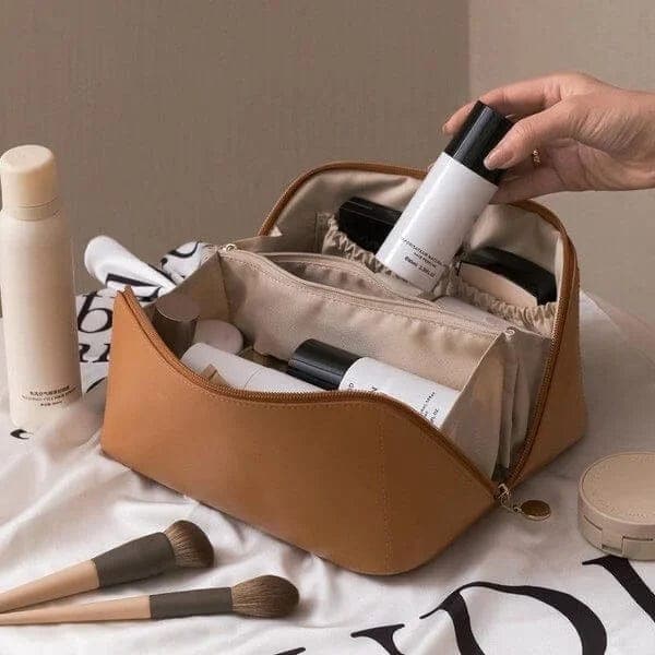Portable women's makeup organizer and travel beauty case. Ideal for storing cosmetics and essentials on the go.
