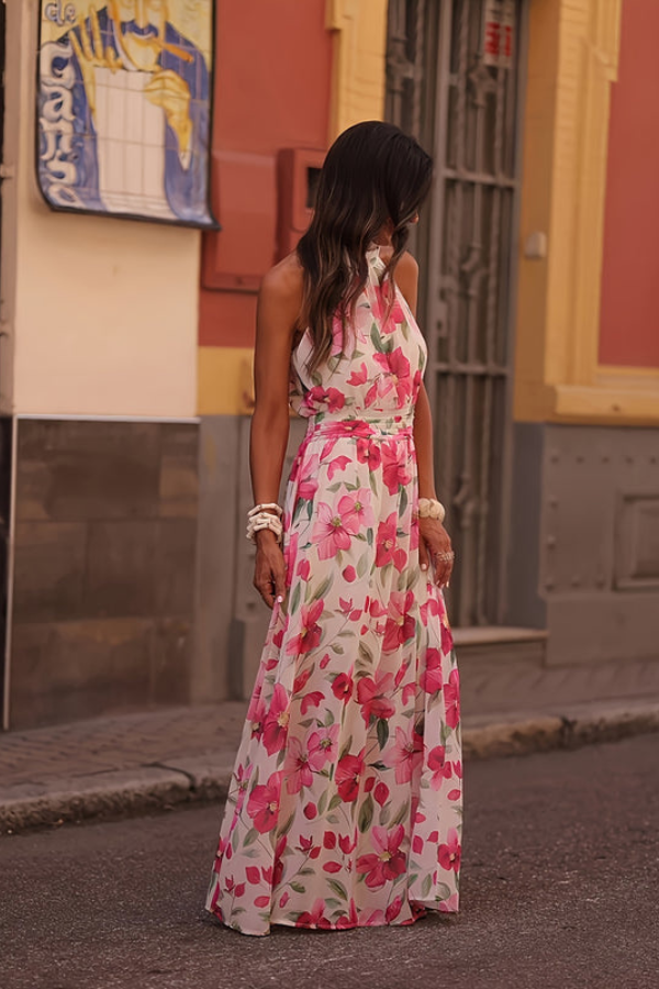 Women's tropical maxi dress, keyhole front, halter neck, vibrant floral print, resort elegant.