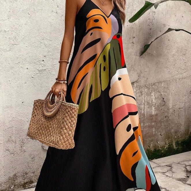 Women's Tropical Maxi Dress, sleeveless, with vibrant leaf print, perfect for summer vacations & beachwear.
