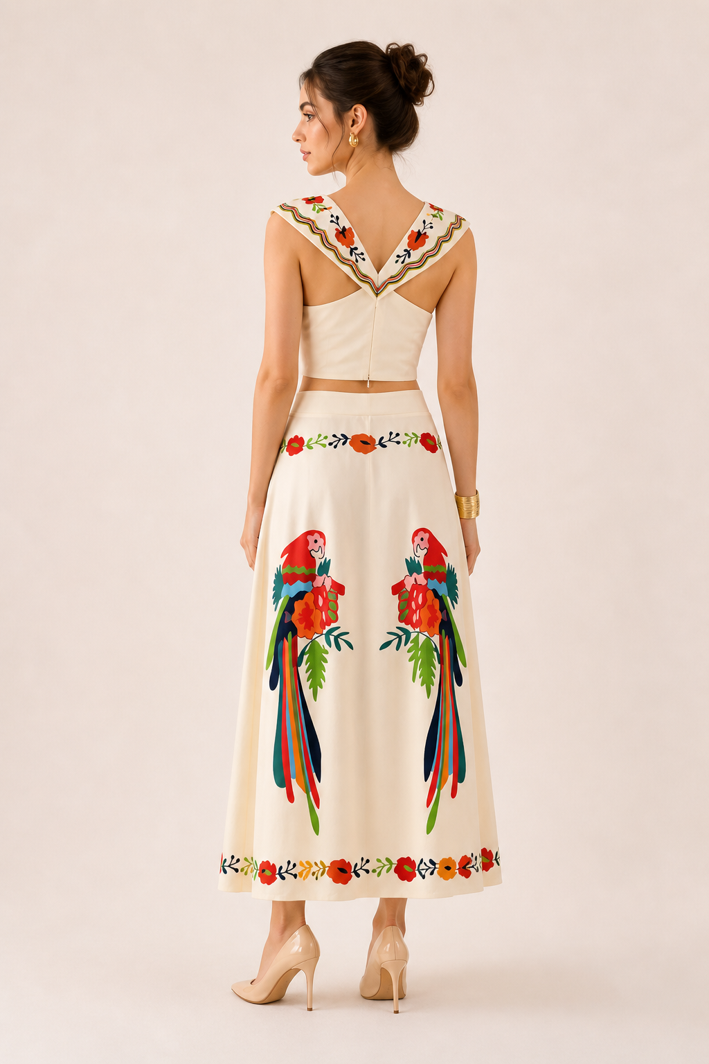 Stylish women's two-piece tropical print set: crop top & maxi skirt, ideal for beach fashion & summer events.