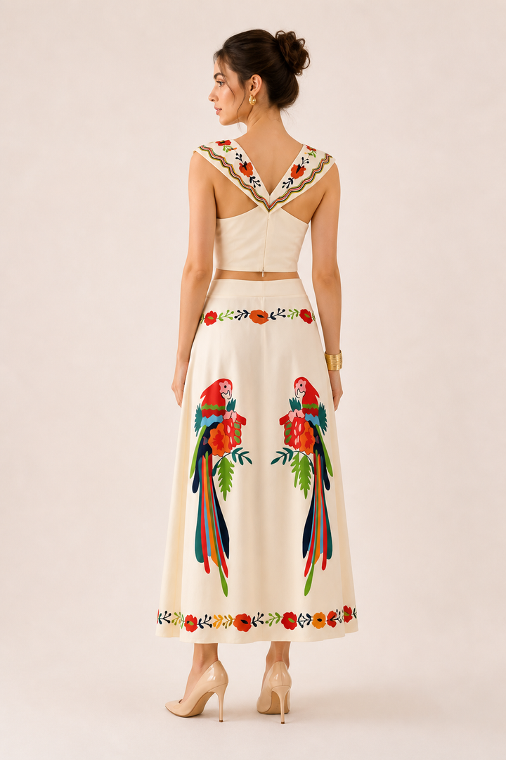 Stylish women's two-piece tropical print set: crop top & maxi skirt, ideal for beach fashion & summer events.