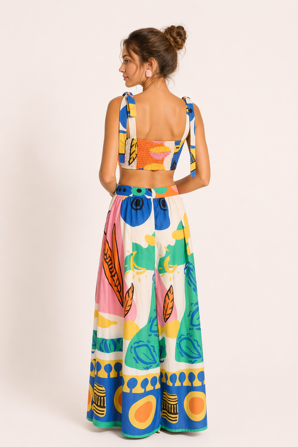 Chic tropical print crop top and flowing long skirt co-ord set for women, ideal resort or summer travel wear.