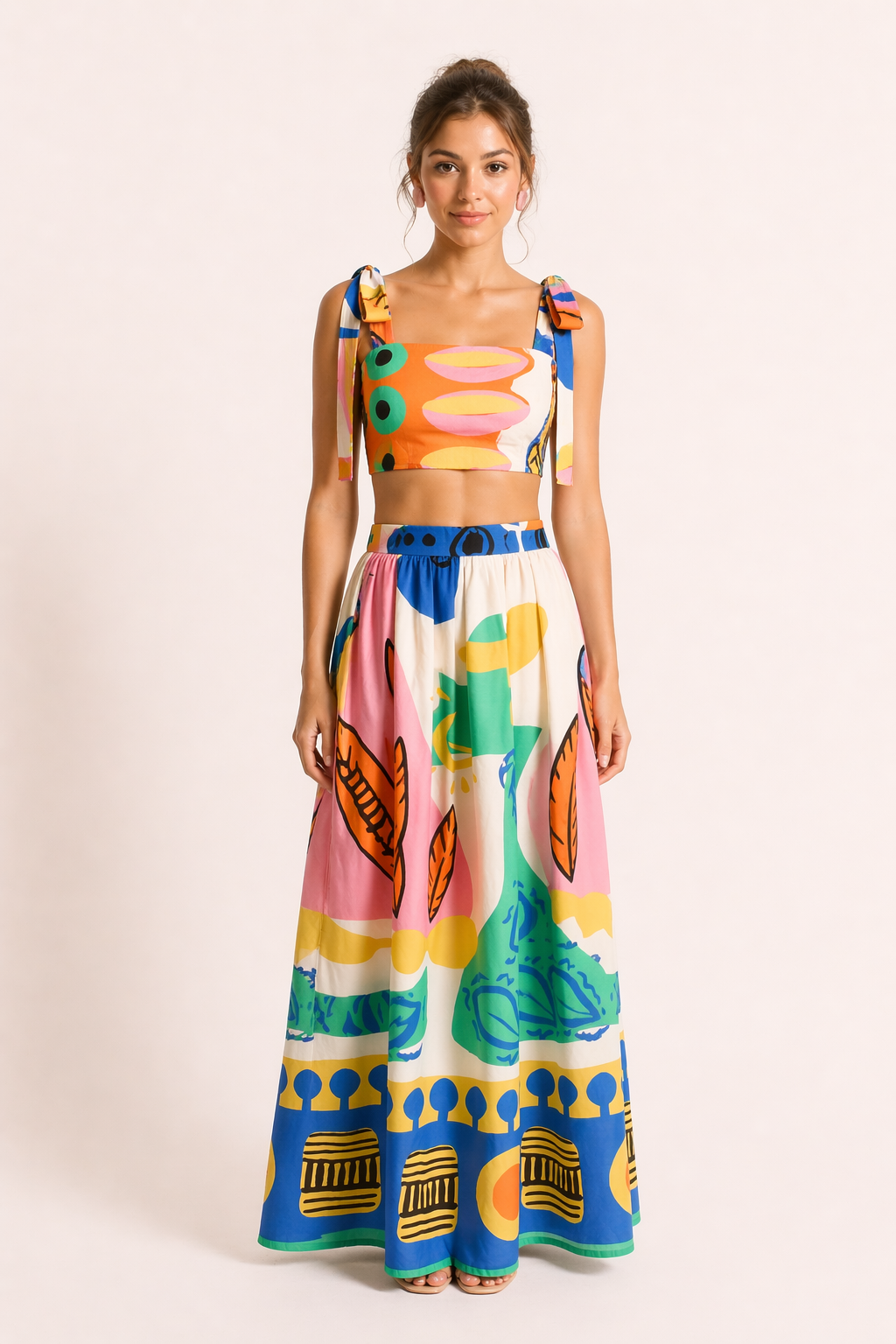 Stylish women's tropical print crop top with matching long skirt two-piece set, a trendy summer fashion outfit.