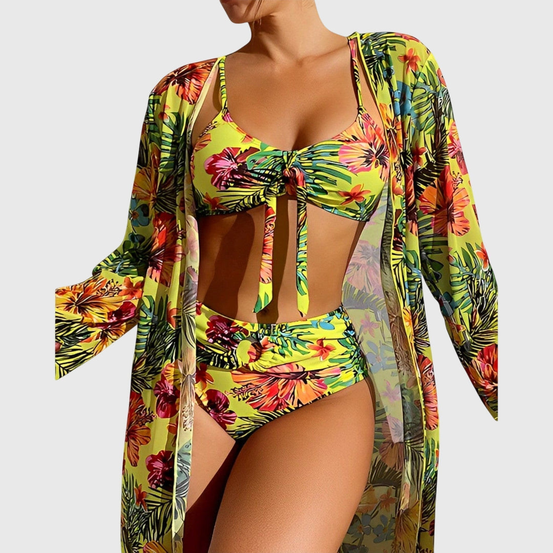 Women's tropical print two-piece bikini swimsuit with vibrant floral design, perfect for beach and pool parties.
