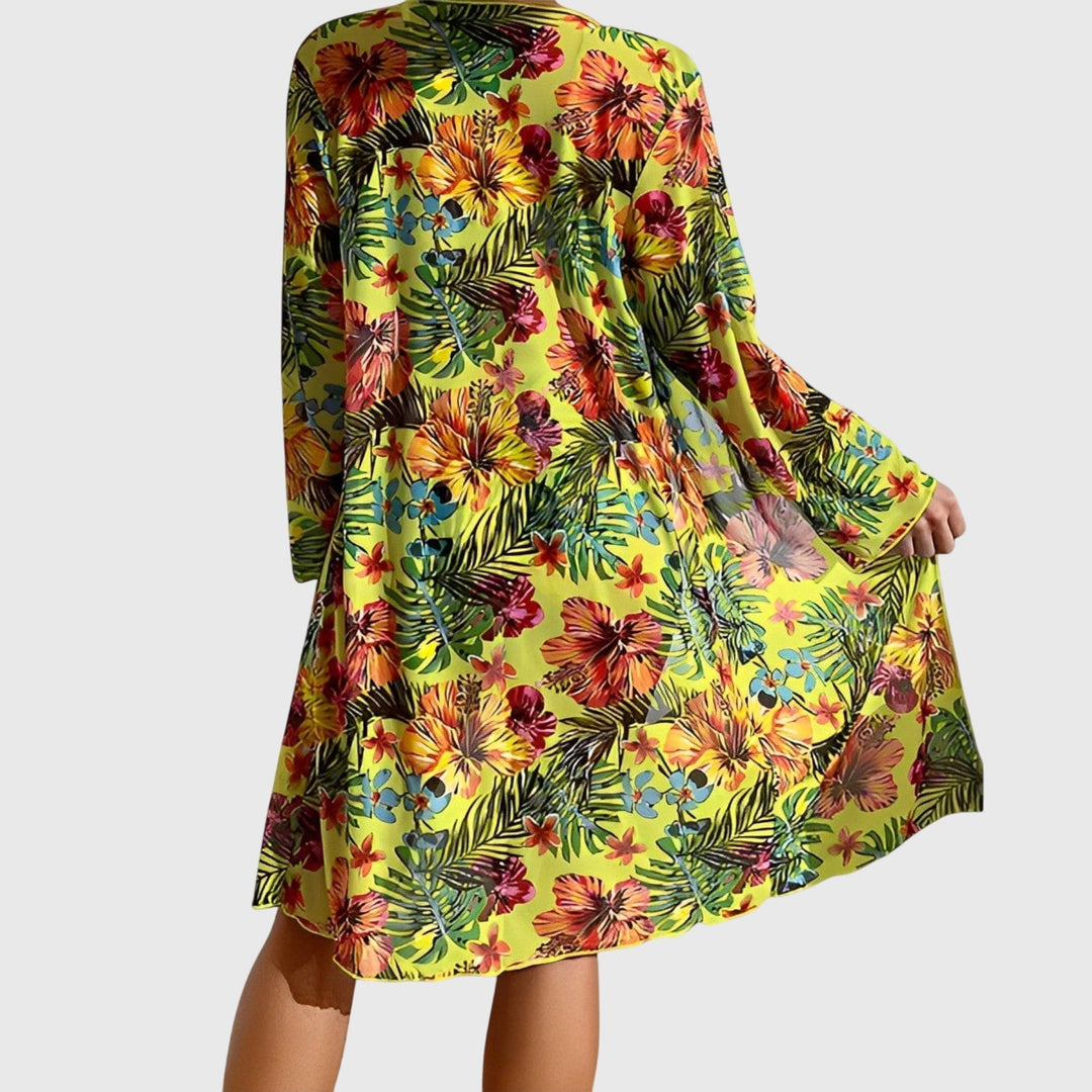 Stylish women's tropical print bikini swimsuit with vibrant floral patterns, great for resort wear and summer.