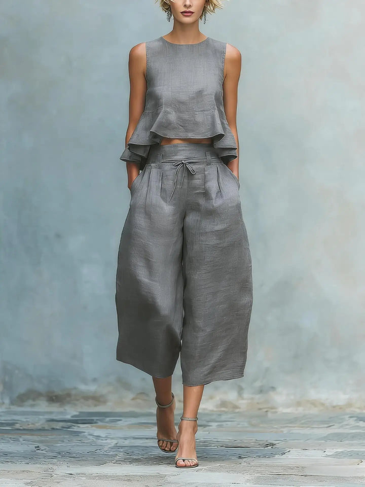 Modern women's crop top & wide leg pant set, an effortless two-piece outfit creating a chic and relaxed look.