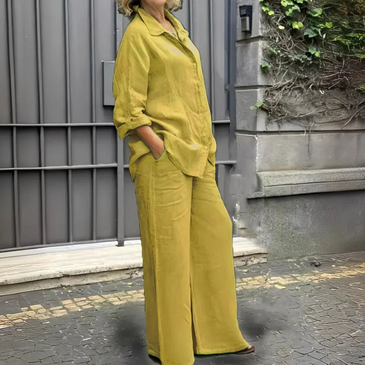 Women's two-piece matching set with a button-up shirt and flowy wide-leg trousers for casual wear.
