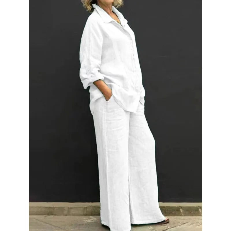 Elegant women's co-ord set: button-up shirt & wide-leg pants, perfect for spring/summer resort style.