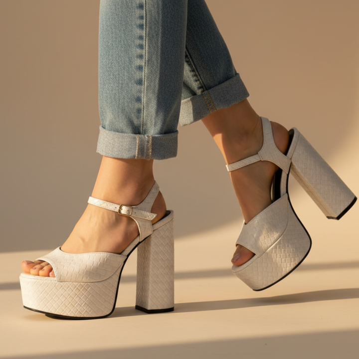 Women's ultra high block heel platform sandals with open toe & buckle strap. Perfect for evening & parties.