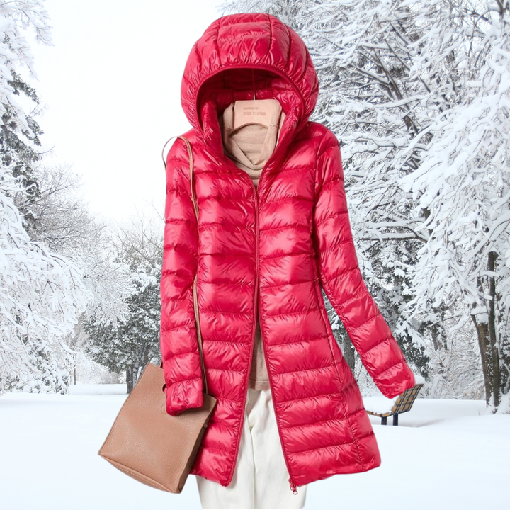 Side view of women's ultra-light insulated hooded jacket, a versatile, lightweight choice for winter & fall.