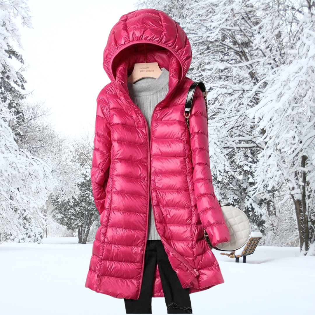 Detail of the comfortable hooded design on a women's ultra-light insulated jacket, providing extra warmth.