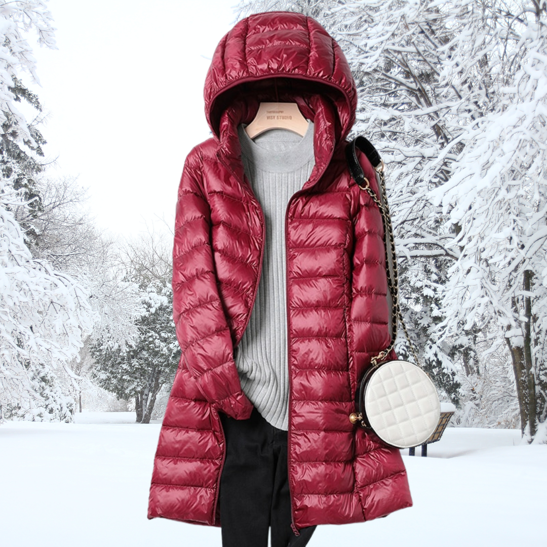 Stylish women's ultra-light insulated hooded jacket, a chic and warm everyday coat for cool weather.