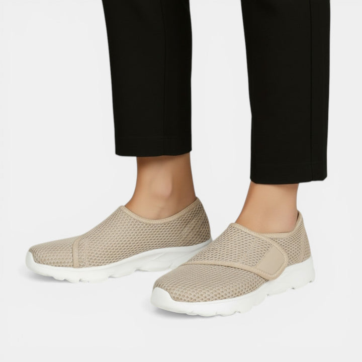 Women's orthopedic walking sneakers; ultra lightweight, breathable design for all-day comfort & support.