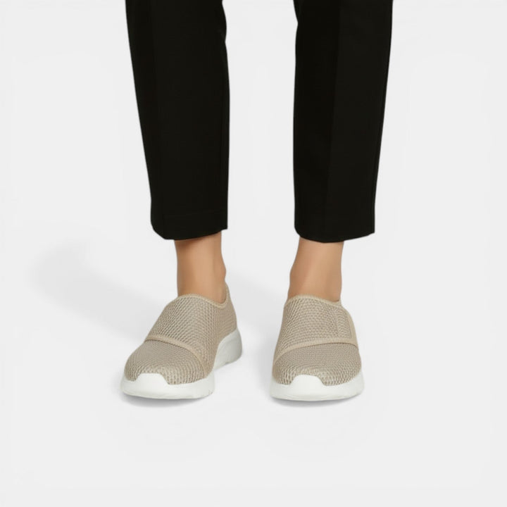 Slip-on women's casual sneakers, offering lightweight orthopedic comfort and essential foot support.