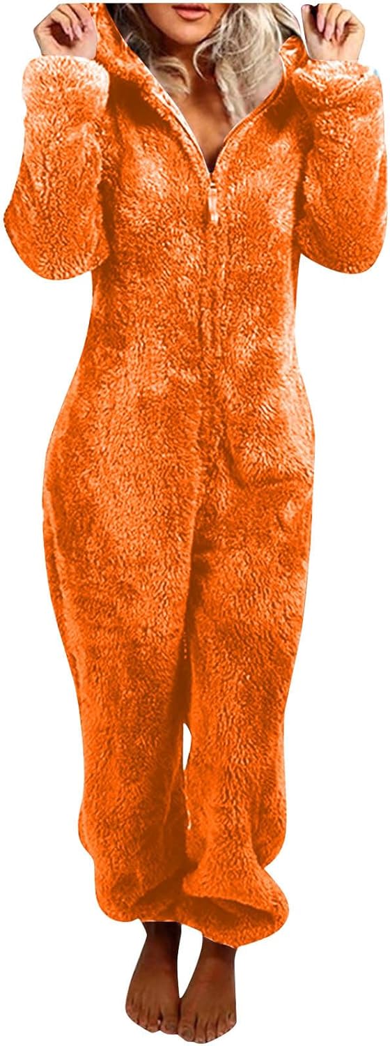 Cozy women's hooded sherpa pajamas, fuzzy onesie for winter comfort.