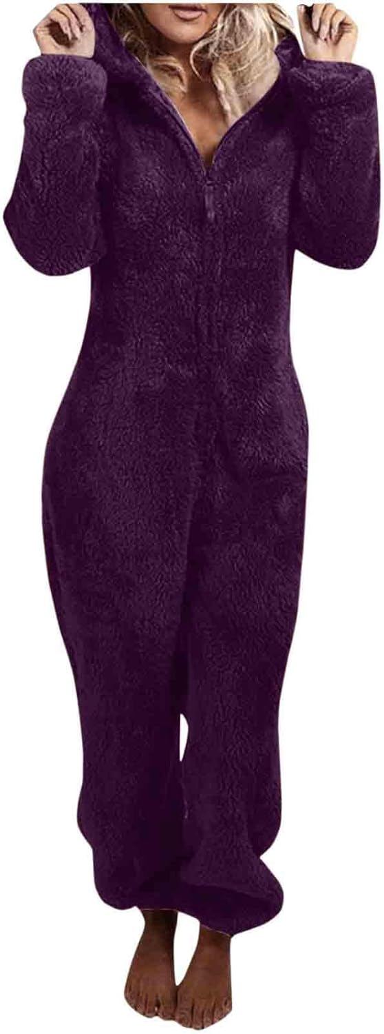 Cozy women's sherpa fuzzy onesie, hooded sleepwear for winter comfort.