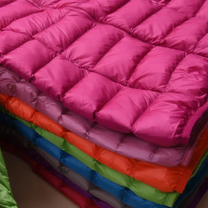 Versatile ultralight coat for women, providing winter warmth and comfort without bulk.