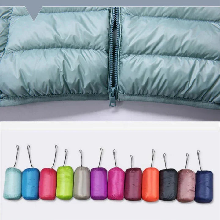 Stylish women's activewear jacket, insulated & hooded, great for outdoor adventures and travel.