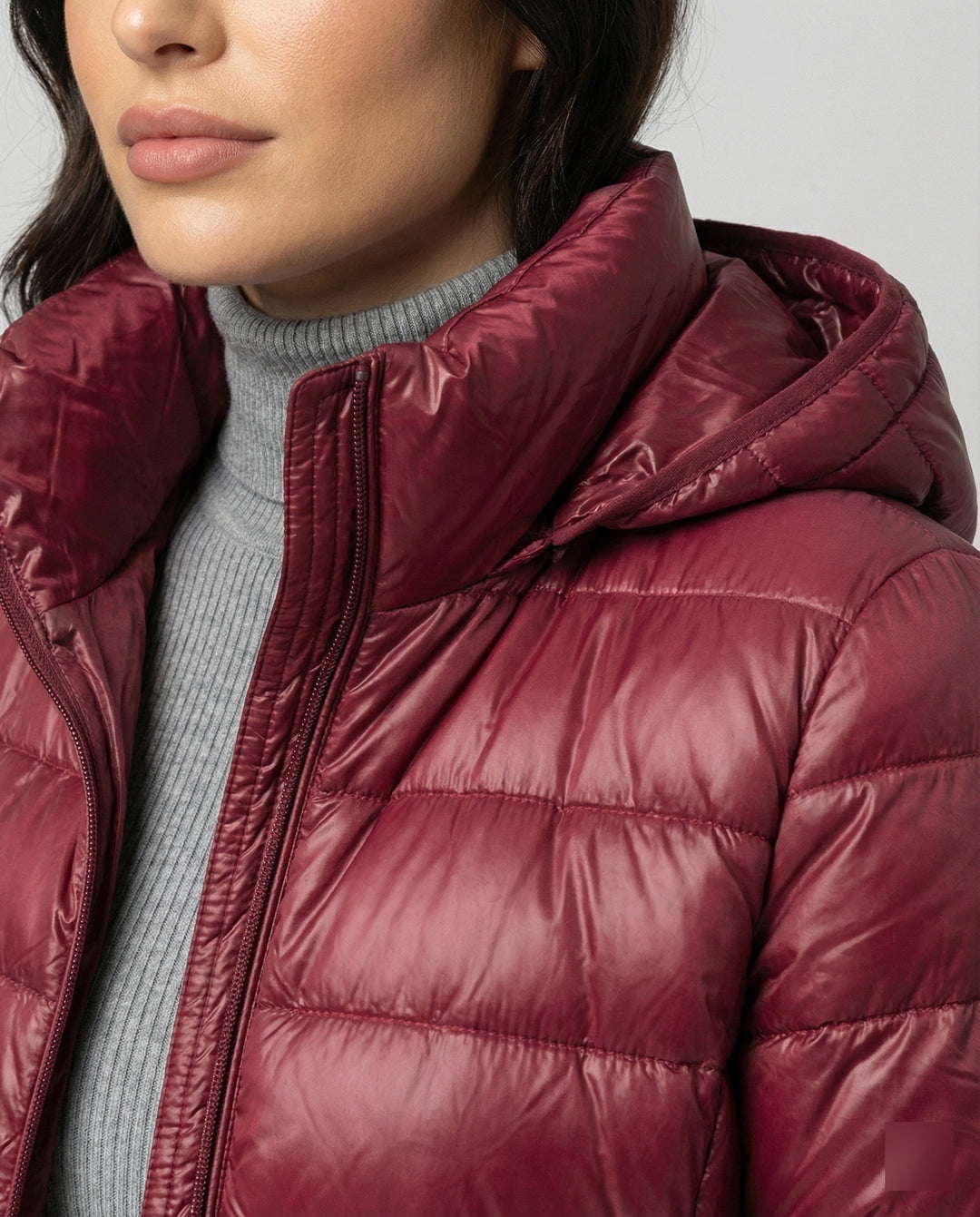 Lightweight women's hooded jacket, insulated & weatherproof for all seasons.