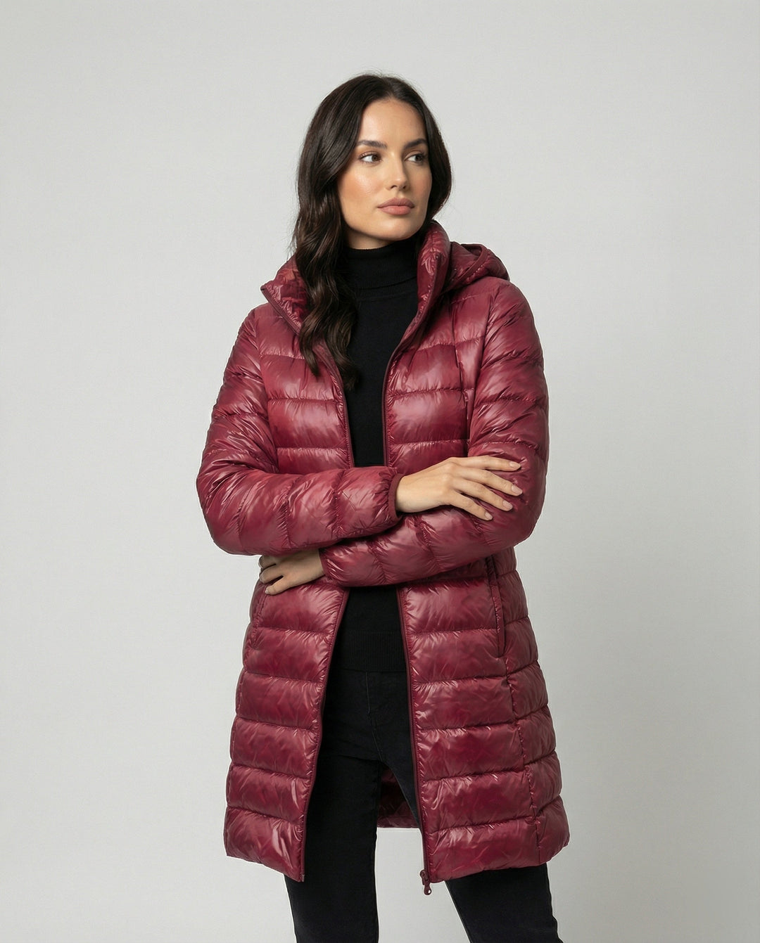 Stylish ultralight women's jacket with hood, ideal for spring, fall, and transitional weather.