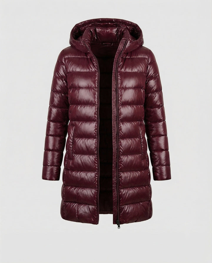 Weatherproof women's hooded jacket, ultralight insulation for year-round comfort.